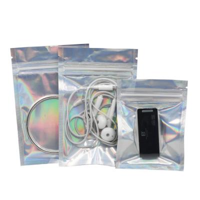 China Moisture Proof Custom Lay Flat One Side Transparent Holographic Reseal Food Mobile Phone Case Jewelry Storage Zipper Laser Packaging Bags for sale