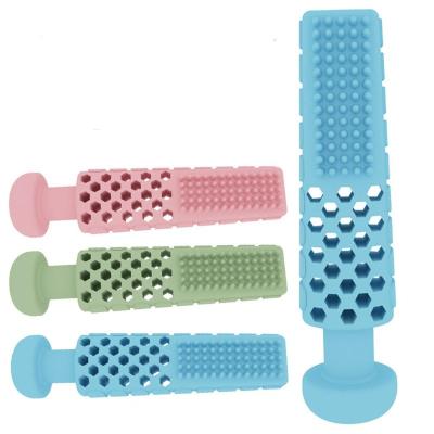 China New Pet Viable Toy Tpr Relief Teeth Grinding Teeth Chewing Paste Shaped Interactive Cleaning Toy for sale