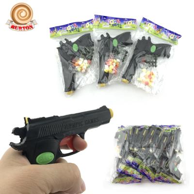 China Cartoon Toys Plastic Cartoon Toys Candy Toy Gun Maker for sale