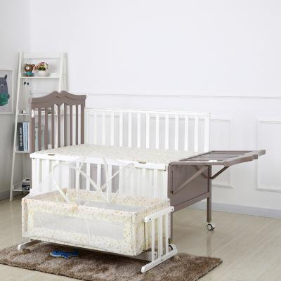 China Modern wooden bew baby furniture bedroom bedside children born cradle with drawer for sale