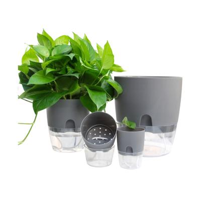 China Planter Pots Self Watering Pots with Absorbent Cotton Rope Plastic Elegant Green Style Modern Flower Plant Pot for Indoor Plants for sale