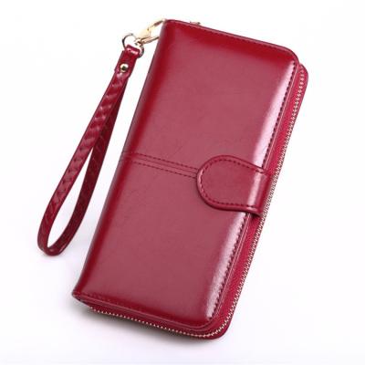 China Oil Waterproof Female Wax Camino Wallet Leather Ladies Travel Purse Zipper Around Clutch Wallets for sale