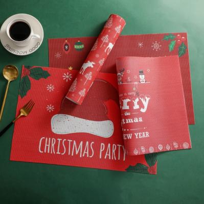 China Viable Wholesale Chirstmas Custom Printed PVC Woven Santa Placemat Dining Table Mat for sale