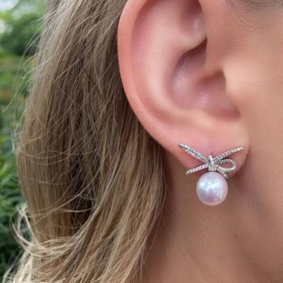 China Promotion cute CZ bow tie stud earring with round pearl beads cute girl women jewelry fashion lovely for sale