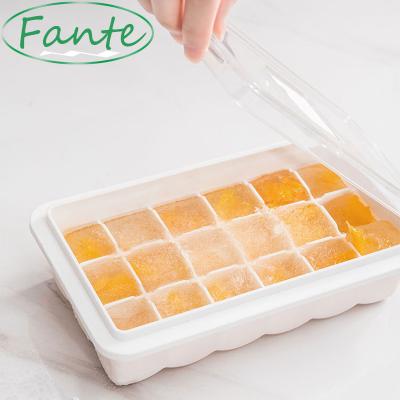 China Stocked Gray Silicone 18 Squares White Silicone Ice Makers Case Ice Cube Tray With Lid Mold for sale