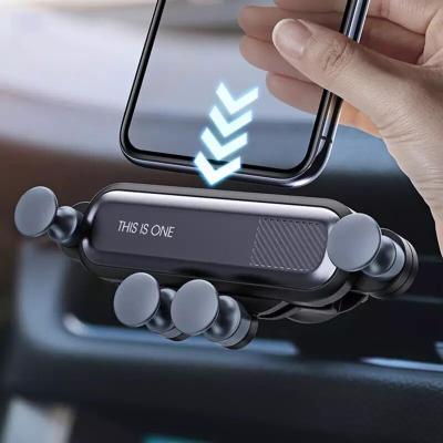 China Strong Magnetic Gravity Car Holder For Phone In Car Air Vent Clip Mount No Magnetic Cell Phone Holder GPS Holder For iPhone 12 for sale