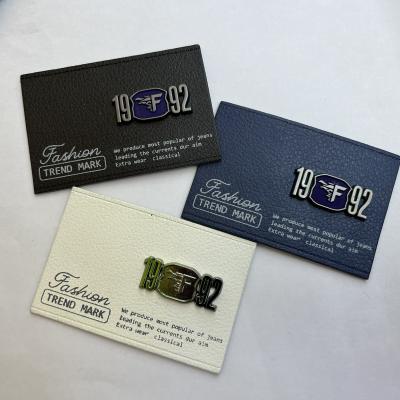 China Other Eco-friendly DFA Leather Label With Zinc Alloy Hardware And Iteam Leather Sew On Label Metal Logo for sale