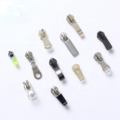 China Other DFA Supplier Direct Sales Different Types Custom Brand Garment Metal Zipper Head Zipper Logo Slider for sale