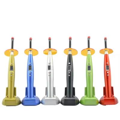 China Dental Led Curing Light Plastic Body Colorful Design Cordless Dental Light Cure Lamp for sale