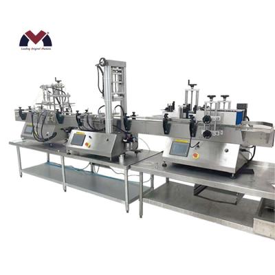 China Hot Current 2021 Food Tour Bottle Ointment Filling Labeling Machine Capping Production Line for sale