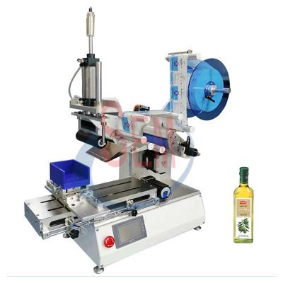 China Automatic Delta PLC+Touch Screen Table Top Plastic Flat Square Pet Bottle Paper Box Labeling Machine for sale