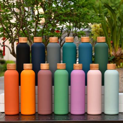 China New Products Sustainable Vendors 1000ml Stainless Steel Cup Insulated Drink Bottle With Bamboo Lid for sale