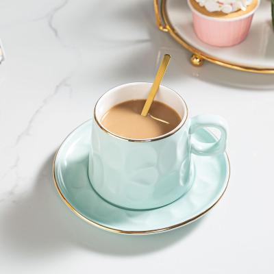 China Viable Nordic Creative Gold Rim Ceramic Coffee Cup and Saucer Set Household Small Cup Set for sale