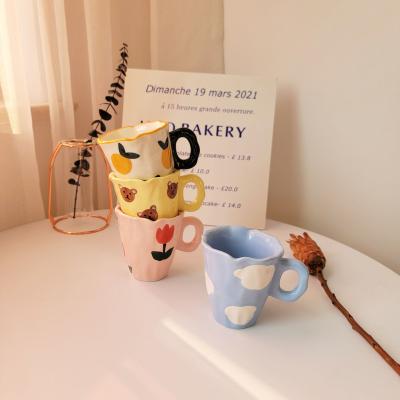 China Viable Cute Yellow Creative Irregular Cloud Coffee Mug Bear Milk Ceramic Water Mug for sale