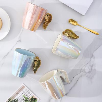 China Viable Creative Ceramic Gold Plated Handle Angel Wing Office Cup Coffee Milk Porcelain Cups For Gift for sale