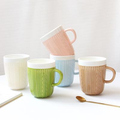 China Viable Wholesale Plain Porcelain Knitting Ceramic Mug Embossed Coffee Mug With Handle for sale