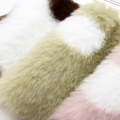 China Cute and Fashion Printed Shrink-Resistant Pajamas Toy Blanket Fabric Dot Faux Rabbit Fur Flannel Bedding for sale