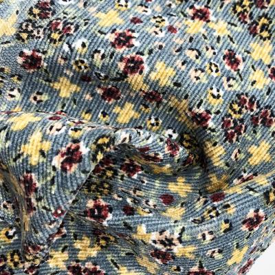 China Blue Blackout Flower Corduroy Fabric Small Pants Printed Fabric For Kids Woven 100% Polyester Printing Fabric for sale