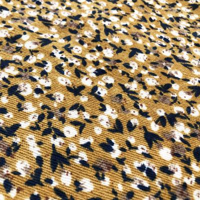 China Blackout 21 wale yellow corduroy fabric for sofa polyester elasticity corduroy wholesale fabric for clothing textile for sale