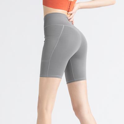 Chine Le contrôle fait sur commande de ventre de Legging de vêtements de sport de forme physique de femmes mais le yoga d'ascenseur halète sans couture à vendre