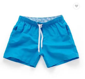 China La playa al por mayor de los pantalones cortos del baloncesto jadea los pantalones cortos de los hombres en venta