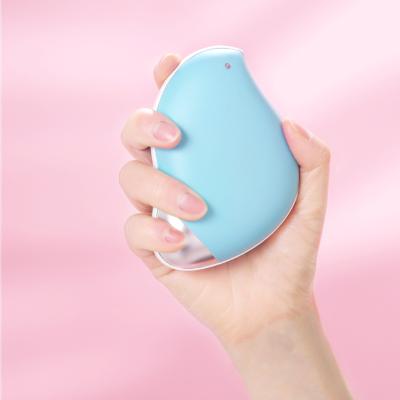 China Hotel Cute Girl Reusable Electric Handwarmer Mini Warmer Usb Powered Hand Warmers With Massage for sale