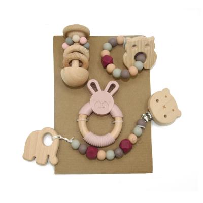 China Eco-friendly Silicone Wristband Teether Set Bpa Free Silicone Baby Ring Beech Wood Teether For Babies for sale