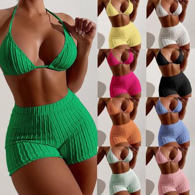 China New Design Breathable Sexy Eyelet Fabric Solid Color Briefs Halter Bikini Set Swimsuit Women Swimwear for sale