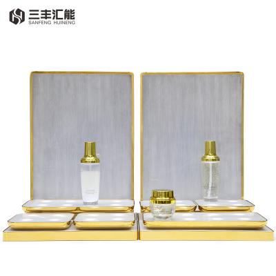 China Cosmetic Shops Show OEM / ODM L Shape Cosmetic Counter Display With Lights Perfume Display Stand Acrylic Lead Cosmetic for sale