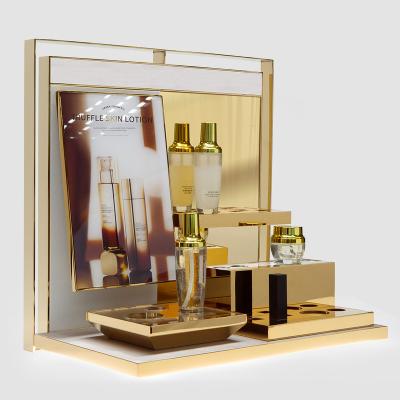 China Metal Sheet OEM/ODM Manufacture Customized High Quality Luxury Gold Color Skincare Cosmetic Metal Display Stand for sale