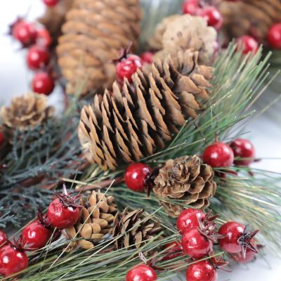 China Durable Artificial China PVC Pine Foliage and Red Berry Decoration Christmas Wreath for sale