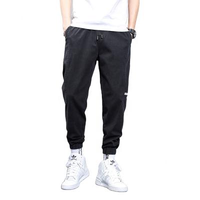 China Anti-wrinkle Mens Polyester Spandex Knit Print Cargo Casual Jogger Panties for sale