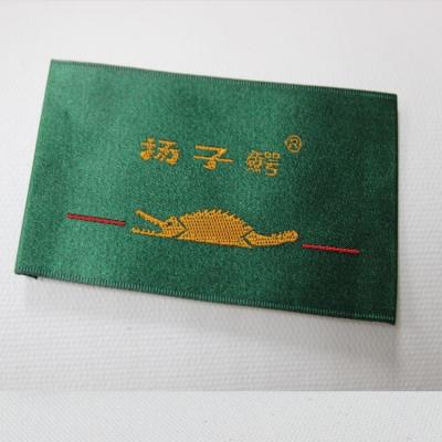 China Sustainable Reflective Garment Labels, Shuttle Loom Woven Label, Swimwear Care Label for sale