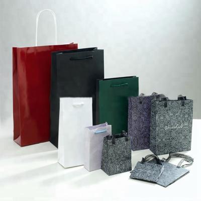 China Recycled Materials Custom Paper Carry Bag Paper Handbag Paper Shopping Bag for sale