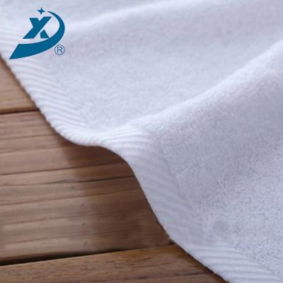 China Compressed Best Widely Used Designs Logo White Hotel Shower Towel , Hotel Price Embroidery High Quality Towel for sale