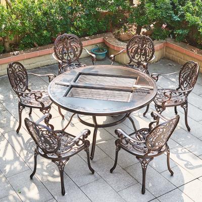 China Outdoor 6 Pieces Weather Durable Round BBQ Table Heavy Duty Grill Dining Set Backyard Furniture Cast Aluminum Garden Furniture for sale