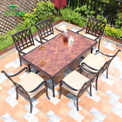 China Weather Resistant Durable Ceramic Tile Top Table With Metal Armchairs 6pcs Cast Aluminum Outdoor Furniture Set For Restaurant Dining for sale