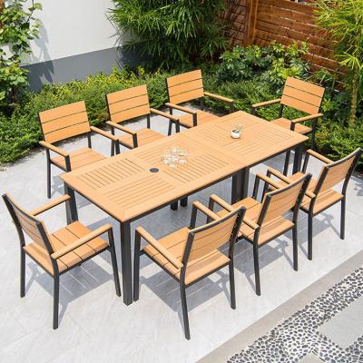 China Waterproof outdoor patio table set 6 8 seaters all weather resistant wood plastic composite table chair for restaurant for sale