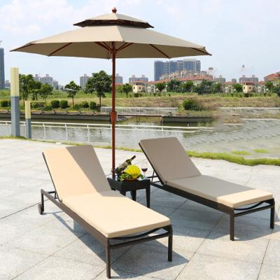 China Handwoven modern outdoor patio furniture recliner convertible rattan/beach lounge chair with umbrella for sale