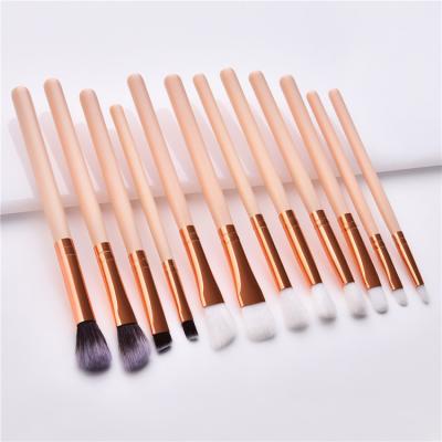 China Negro de madera Rose Gold Pink del sistema de cepillo del maquillaje de la sombra de ojos de la manija 12pcs en venta