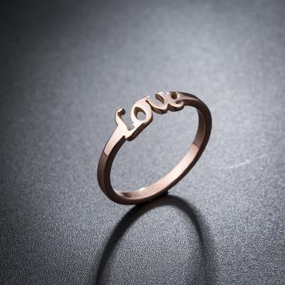 China New CLASSIC Titanium Steel Rose Gold Ladies Ring Simple Love Letter Fashion Couples Ring for sale