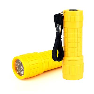 China Portable Mini Flashlight 3AA Battery LED Hand Torch Warm Plastic Yellow Light For Outdoor for sale