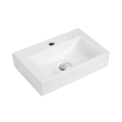 China Modern Rectangular Art Sink Elegant Ceramic Table Top Bathroom Sinks And Basins for sale