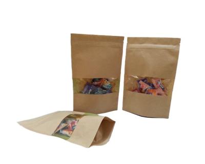 China Disposable Kraft Paper Packaging Stand Up Ziplock Pouch With Window for sale