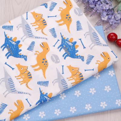 China Sustainable Dress Pajama Use Cotton Poplin Dinosaur Printed Fabric for sale