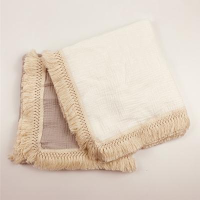 China 2021 INS Portable Hot Selling Newborn Muslin Fringe Baby Crinkle Cotton Wrapped Pure Color Wrapped Children's Blankets for sale