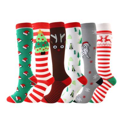 China Custom Antibacterial Clean Crew Socks Fashion Christmas Striped Cotton Polyester Unisex Knee High Socks Mens Womens Designer Dress Tube Socks for sale