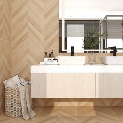 China Rustic Tiles Foshan fishbone wooden tiles matt glazed wood grain tiles wear resistance living room indoor tiles for sale