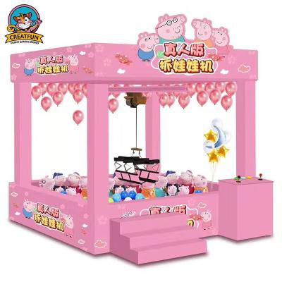 China Can Put Different Gifts Inside 2020 Most Attract Coin Operated Games Human Claw Machine Game For Mall for sale