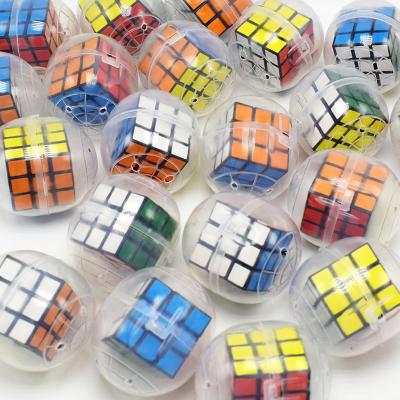 China Manufacturer Wholesale 47-55mm Plastic Empty Plastic Cube Capsule Selling Toy With Transparent Egg for sale